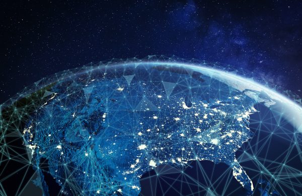 Telecommunication network above North America and United States viewed from space for American 5g LTE mobile web, global WiFi connection, Internet of Things (IoT) technology or blockchain fintech. Some elements from NASA (https://eoimages.gsfc.nasa.gov/images/imagerecords/57000/57752/land_shallow_topo_2048.jpg)