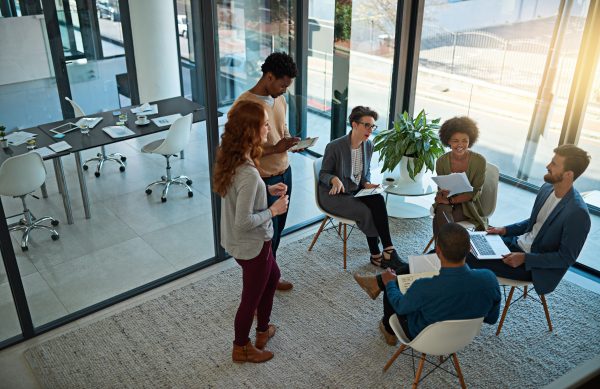 Shot of a group of creatives having a meeting in a modern office